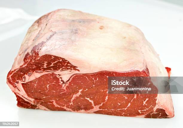 One Piece Of Raw Sirloin On White Background Stock Photo - Download Image Now - Bottom Round, Beef, Strip Steak