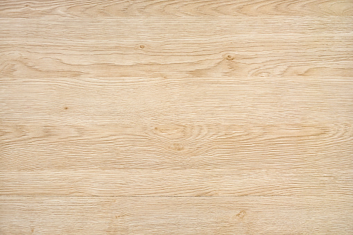 Light natural wood board composed of six logs. All boards have a strong clear texture of wood and some contain knots. The plank is new and clean. A wood grain pattern featuring even grains of wood running horizontally across the image.