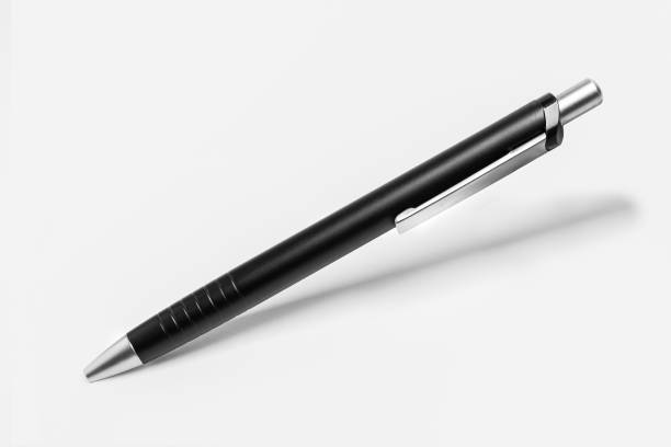 istock An elegant black ballpoint pen suspended in space on a uniform white background 1142424663