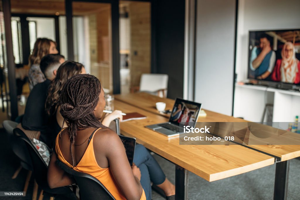 Geschäftsteam auf einem Treffen - Lizenzfrei Videokonferenz Stock-Foto