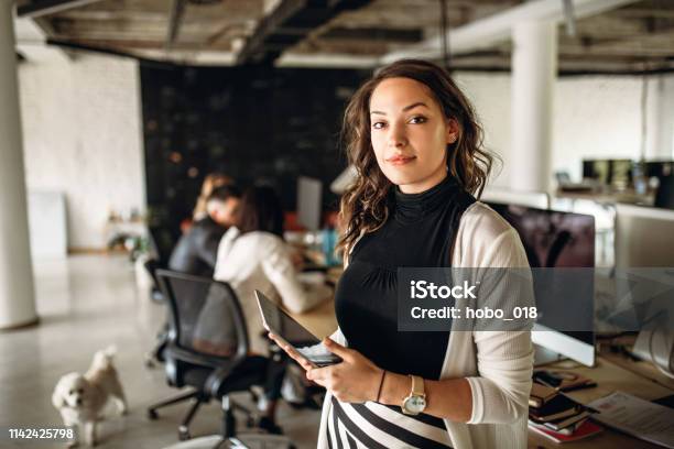 Photo Of Young Business Woman In The Office Stock Photo - Download Image Now - Women, Young Adult, Office