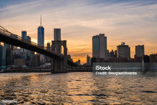 View Of The Brooklyn Bridge During A Dusk From East River New York City Stock Photo - Download Image Now