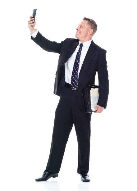 istock Businessman is taking a selfie 1142428174
