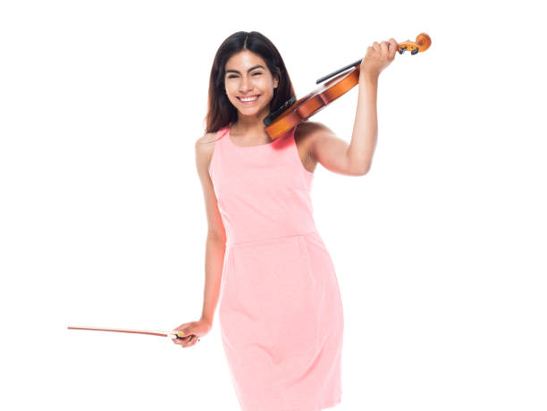 istock Beautiful young latina playing the violin 1142428310