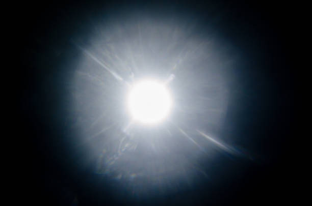 istock Abstract Natural Sun flare or Far star on the black background 1142429633