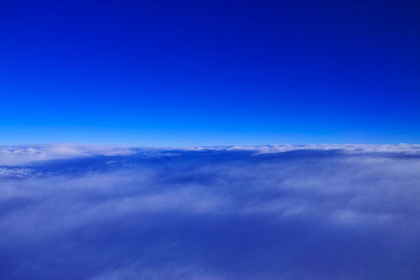 istock Blue sky and sea of clouds 1142432484