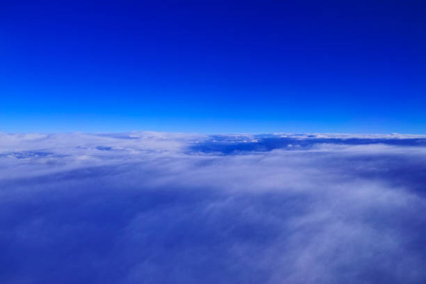 istock Blue sky and sea of clouds 1142432489