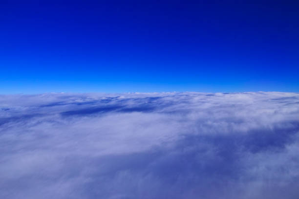 istock Blue sky and sea of clouds 1142432496