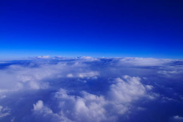 istock Blue sky and sea of clouds 1142432500