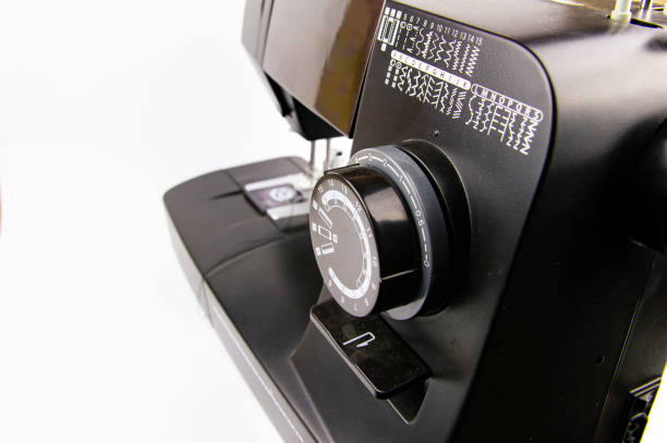 istock Modern electric sewing machine on a white background. 1142434157