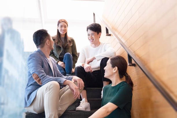 istock Young Asian Entrepreneurs Discussing Business Ideas 1142435250