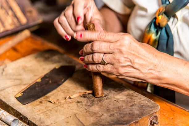 istock Woman making cigar - Trinidad - Cuba 1142435686