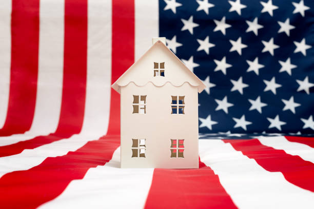 istock house on American flag background 1142438712