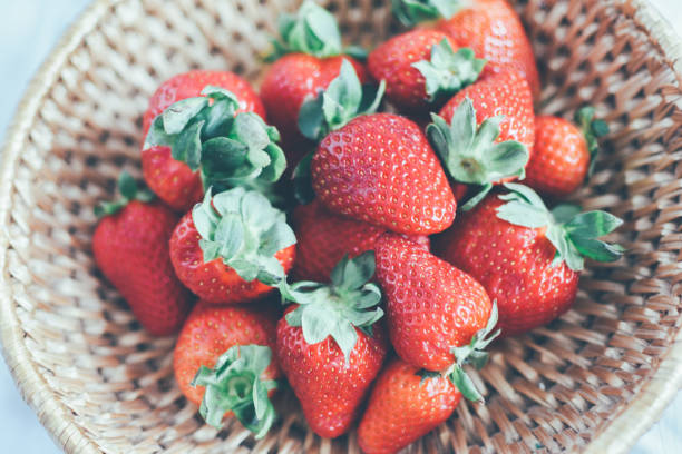 istock Fresh strawberry in a clay plate 1142441262