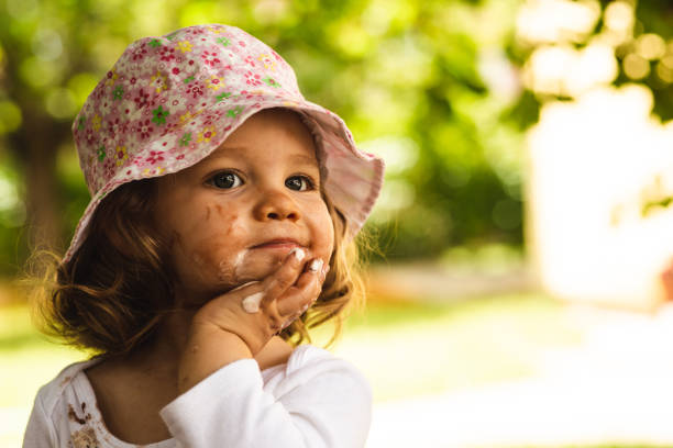 istock Little lady enjoying ice cream 1142441349