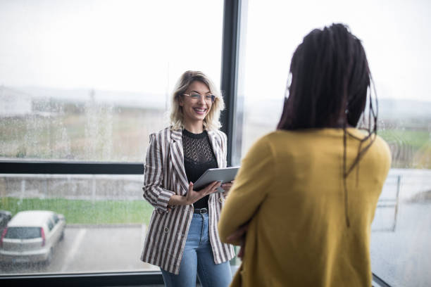 istock Female manager discussing business 1142441816