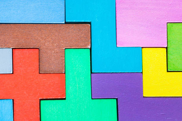 istock board with assembled puzzle from wood pentominoes 1142442112