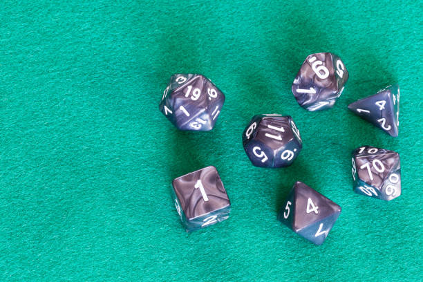 istock gray polyhedral dices for Dungeons and Dragons 1142442114
