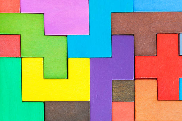 istock background from assembled puzzle from wood blocks 1142442120