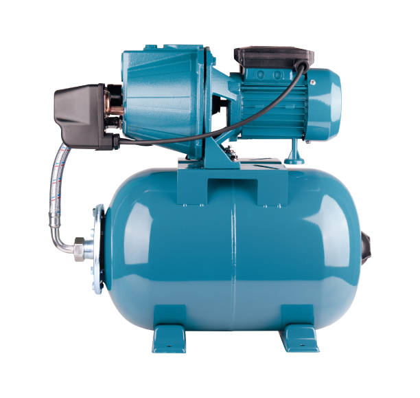 istock Automatic water supply station isolated white background. Powerful pump casing, pressure sensor. Blue color station. Rele, cable, hose, pressure sensor. Application in homes, country village, cottage. 1142443426