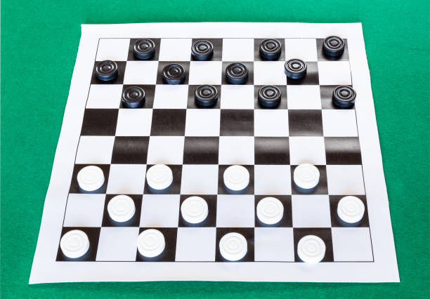 istock checkers on black and white checkered sheet board 1142445913