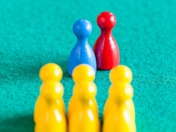 istock pair from blue and red pawns in front of squad 1142446007
