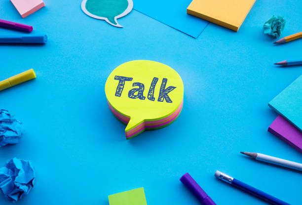 istock Post text on chat,speech bubble on blue desk table color background.social media and online marketing 1142448661