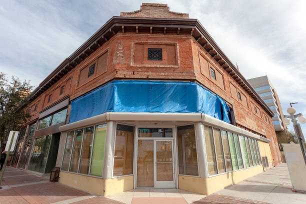 Edwardian brick and terracotta commercial building with neighborhood shops on 95th Street in Washington Heights, a Chicago community on the Far Southwest Side. No people.