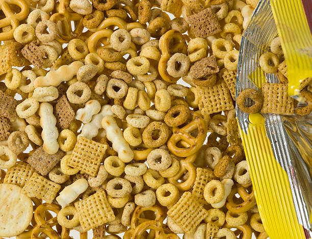 istock Whole grain snacks coming out of the bag background 114245518