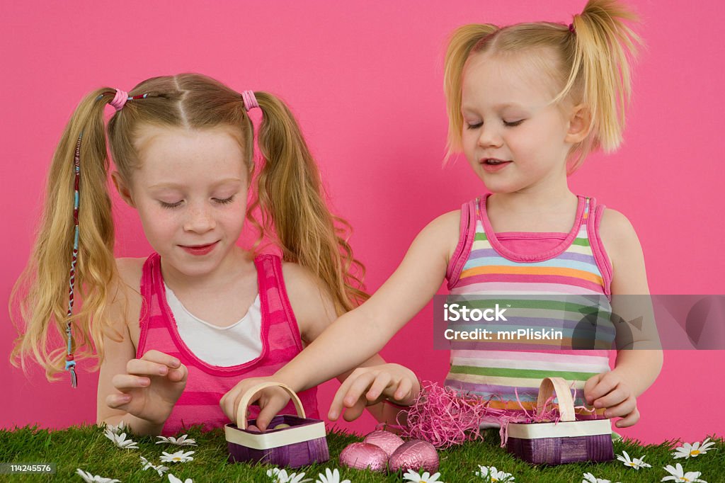 Making an Easter basket Making Easter baskets. Easter Basket Stock Photo