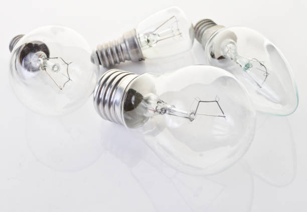 istock Many different types of incandescent bulbs close-up. Obsolete technologies. The concept of energy consumption. 1142468576