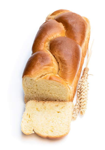 istock Homemade brioche loaf isolated on white 1142469058