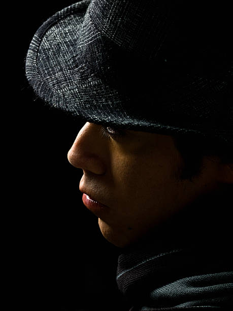 istock Profile of a Hispanic Male with Hat 114247011