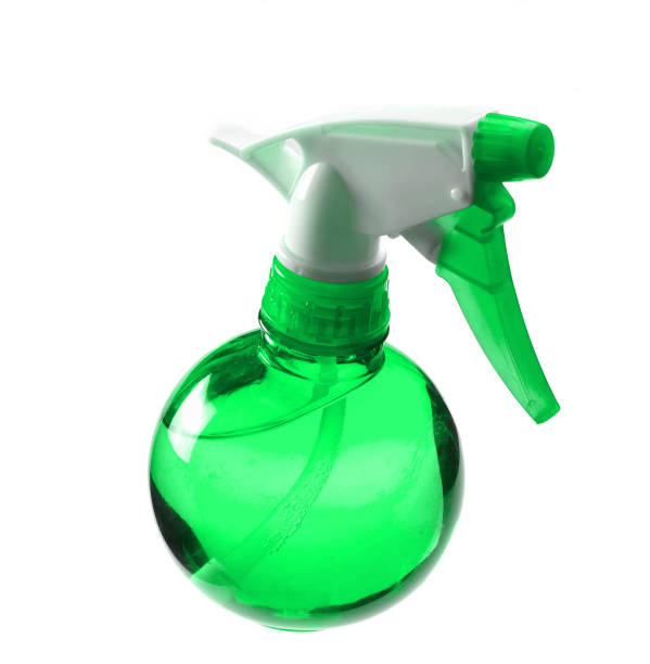 istock Plastic green bottle of sprayer isolated on white background. 1142470541