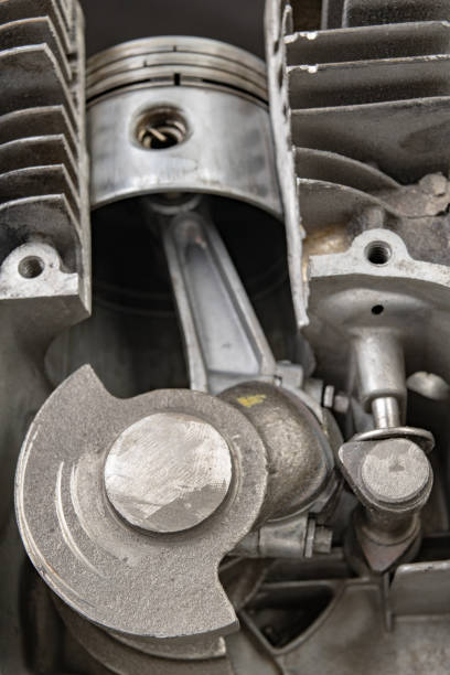 istock A four-stroke gasoline engine in section. The interior of a single-cylinder internal combustion engine. Dark background. 1142474001