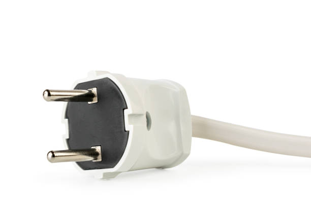 istock White electric cable plug close-up on a white. Isolated 1142478628