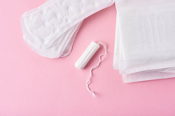 istock Sanitary pad and menstrual tampon on a pink background 1142479241