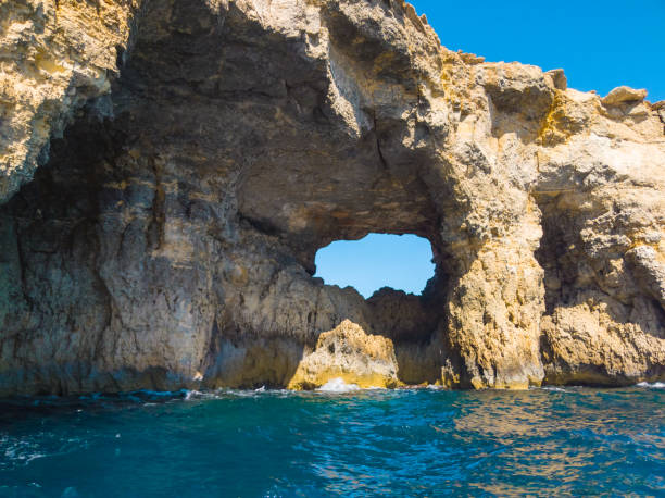 istock Cave in Comino island. Cliffs and blue sea. Malta country 1142481026