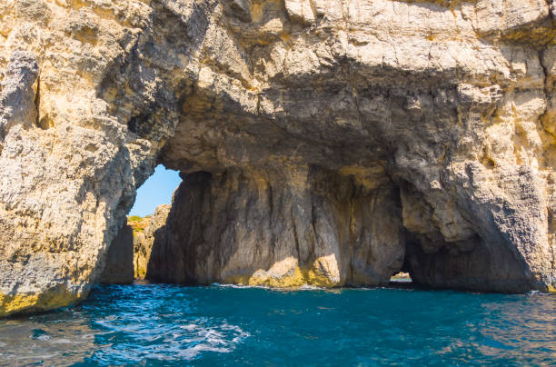 istock Cave in Comino island. Cliffs and blue sea. Malta 1142481071