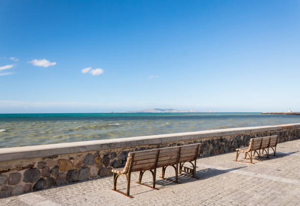 Two benches on the Promenade des Anglais, Nice, France.