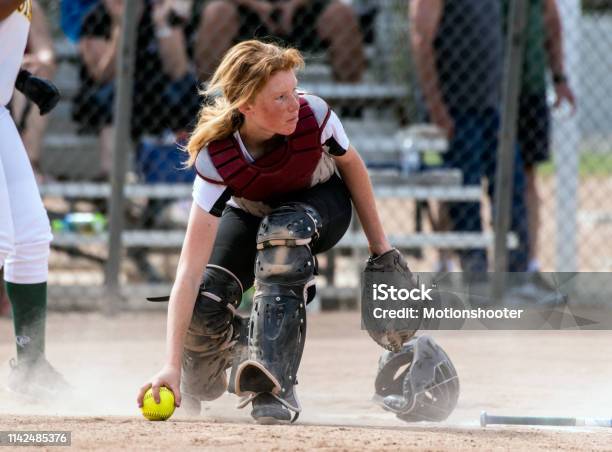 Hustling In A Cloud Of Dust Stock Photo - Download Image Now - High School, Athlete, Child