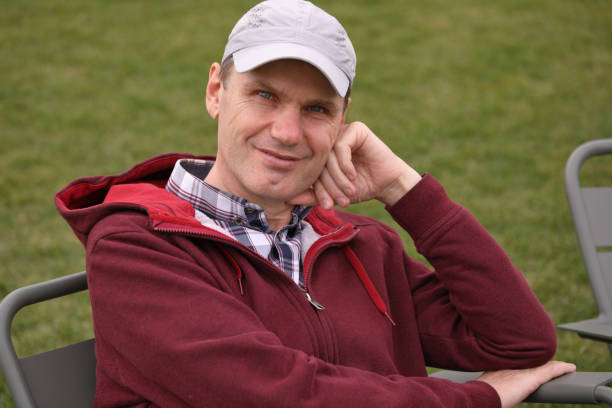 istock Man resting in a city park 1142487084