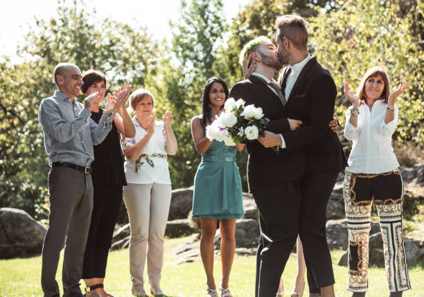 istock kissing guy at the wedding 1142487239