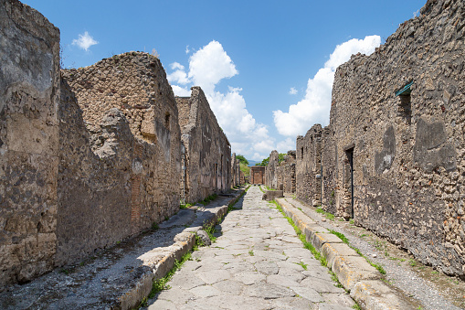 Typical old street at the ruins of ancient Roman city of Pompeii, Province of Naples, Campania, Italy.