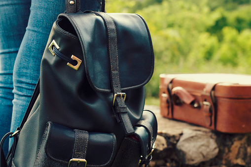 hipster backpack and a vintage suitcase