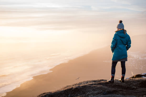 Young woman traveling solo in Iceland stock photo