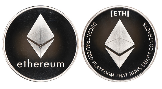 Vinnitsa, Ukraine – April 12, 2019: Silver ethereum isolated on white background. Front and back sides are shown. High resolution photo.  Full depth of field.