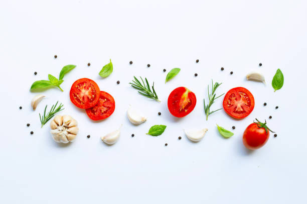 istock Various fresh vegetables and herbs on white background. Healthy eating concept 1142505580