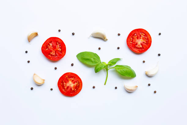istock Various fresh vegetables and herbs on white background. Healthy eating concept 1142505636