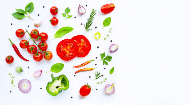 istock Various fresh vegetables and herbs on white. Healthy eating concept 1142506293